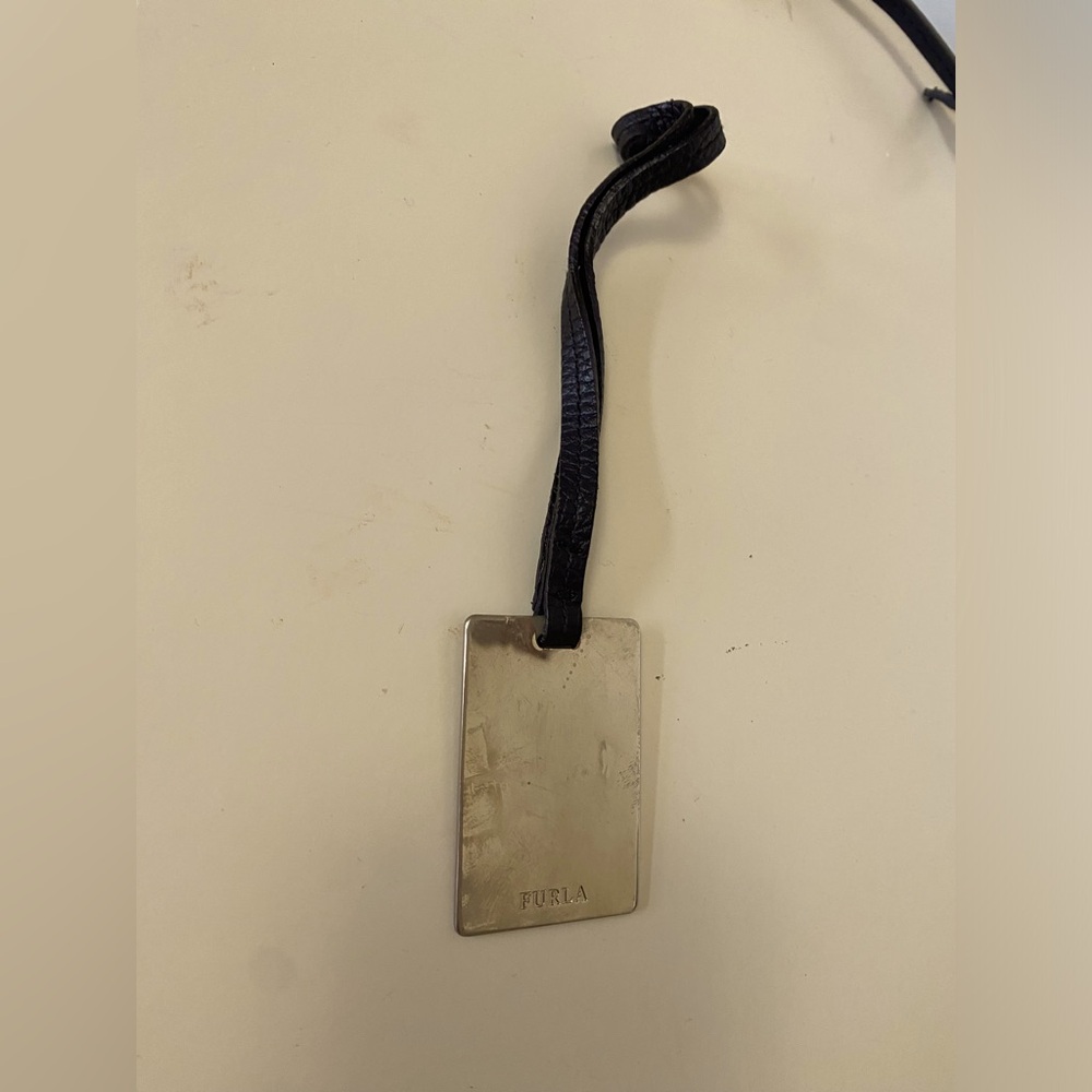 Furla black bag tag